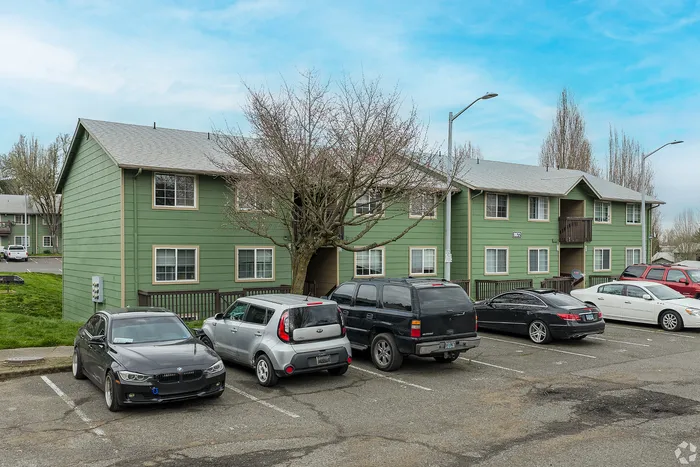 apartment building with green siding