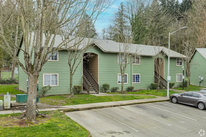 apartment building with green siding