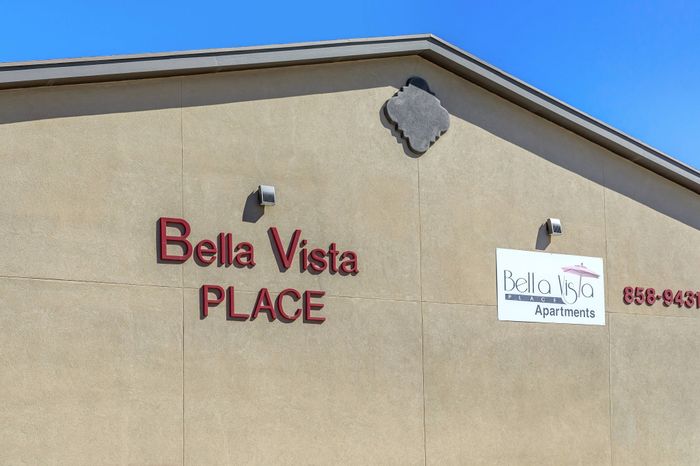 Exterior Bella Vista Place Apartments signage on the community building in El Paso, TX