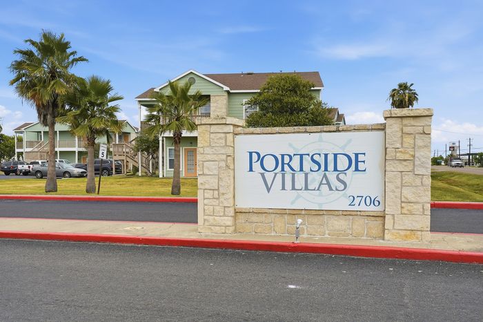 Leasing office with modern decor and customer service area at Portside Villas in Ingleside, TX.