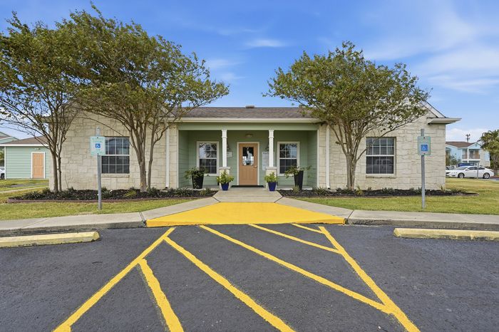 Leasing office with modern decor and customer service area at Portside Villas in Ingleside, TX.
