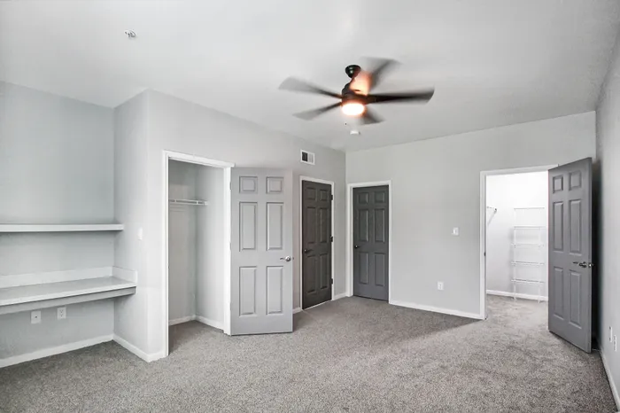 Large bedroom with built-in desk