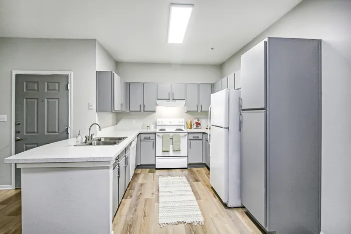 Upgraded Kitchen with wood-style flooring