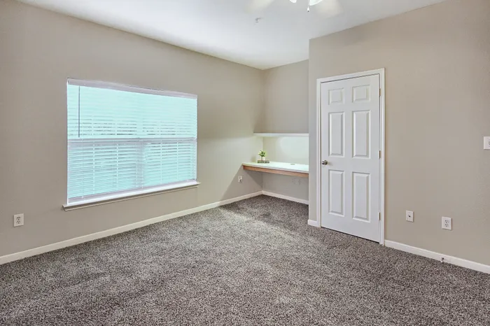 Bedroom with built-in desk