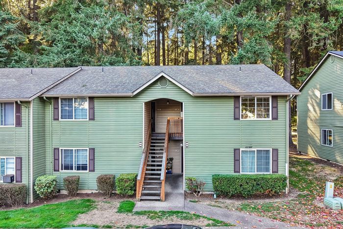 Apartment building with green siding