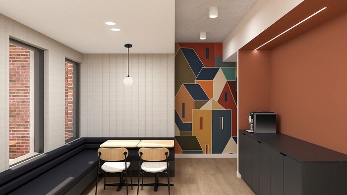 Contemporary lounge area with modern seating, vibrant geometric wall art, and a sleek coffee station.