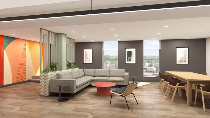 Chic modern living area with vibrant wall art, a cozy sectional sofa, stylish dining area, and floor-to-ceiling windows offering stunning outdoor views.
