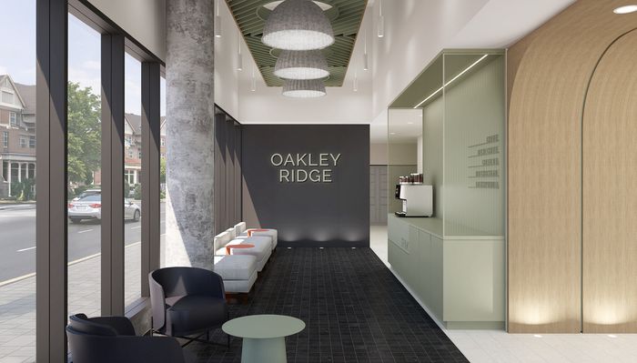Inviting lobby of Oakley Ridge with modern seating, large windows, and stylish decor, offering a welcoming atmosphere.