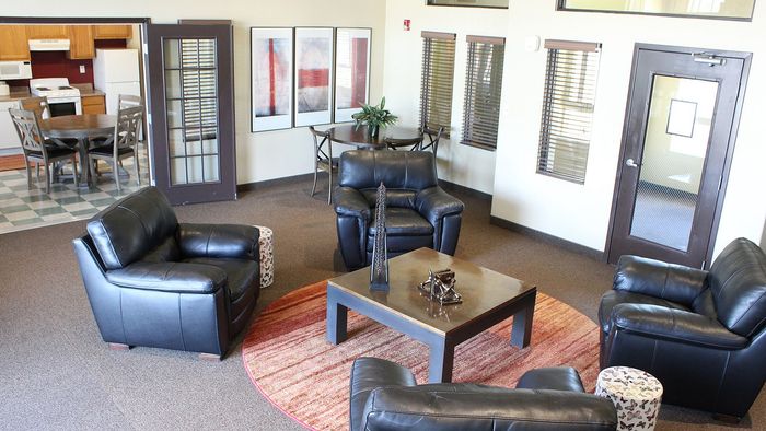 Metro Flats resident clubroom with lounge seating and gathering areas