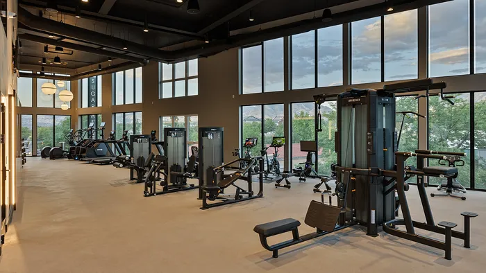 Sugar Alley fitness center in the evening with cardio and strength equipment