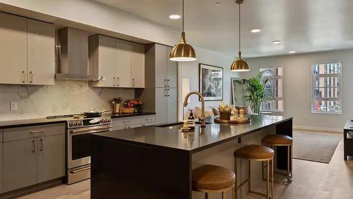 Full view of Jade kitchen layout with modern appliances and island