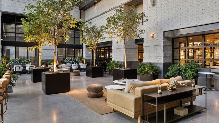 Glass Atrium Lounge at Sugar Alley – glass atrium with different seating areas