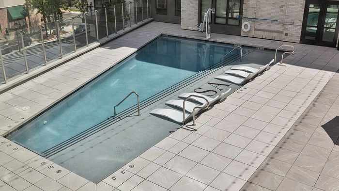 Resort-Style Pool Deck at Sugar Alley – pool side view