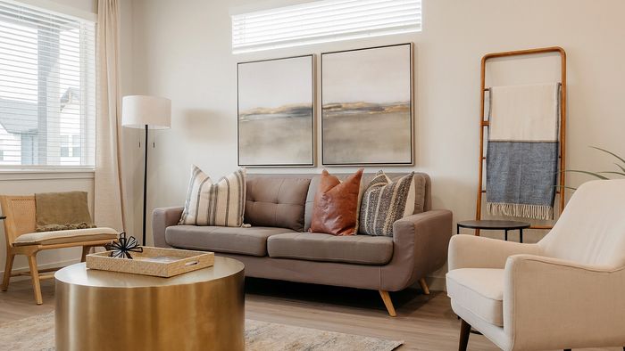 Living area at RailRunner townhomes showcasing open space, natural light, and modern finishes.
