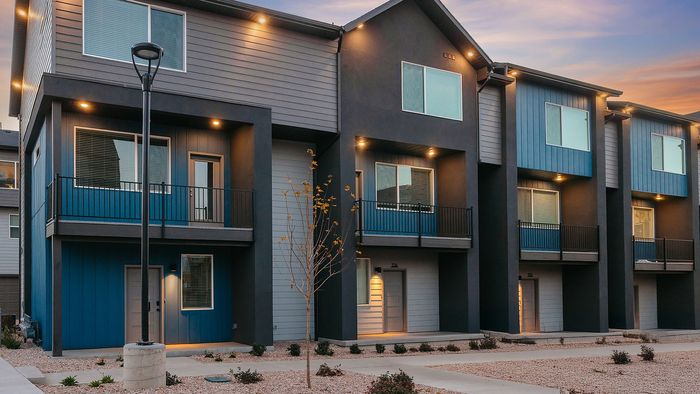 Modern townhome buildings at RailRunner featuring contemporary design and clean exterior lines.