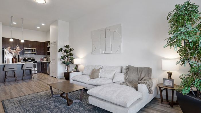 Merritt 1 bedroom apartment open living room and kitchen at Parkway Lofts in Orem Utah