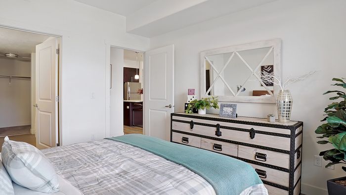 Palisades 2 bedroom apartment primary bedroom with ensuite access at Parkway Lofts in Orem Utah
