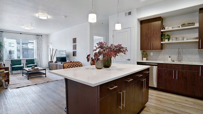 Palisades 2 bedroom apartment kitchen island with modern finishes at Parkway Lofts in Orem Utah