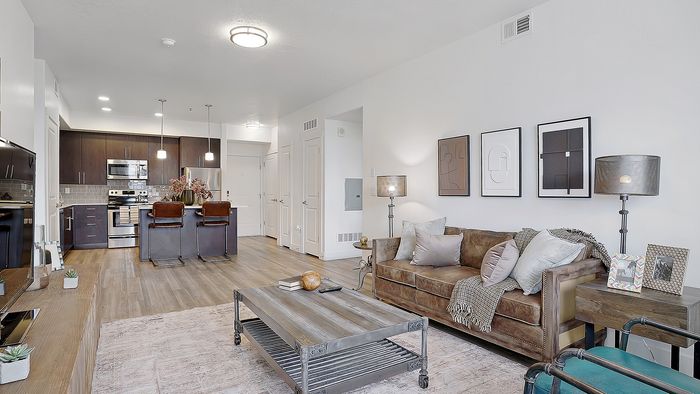 Palisades 2 bedroom apartment open living room and kitchen at Parkway Lofts in Orem Utah