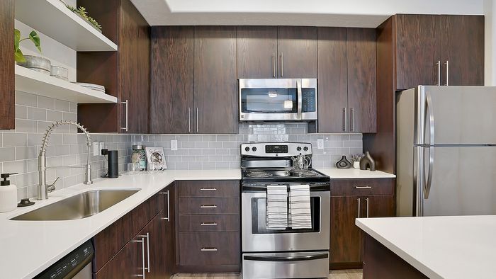 Palisades 2 bedroom apartment kitchen with stainless steel appliances at Parkway Lofts in Orem Utah