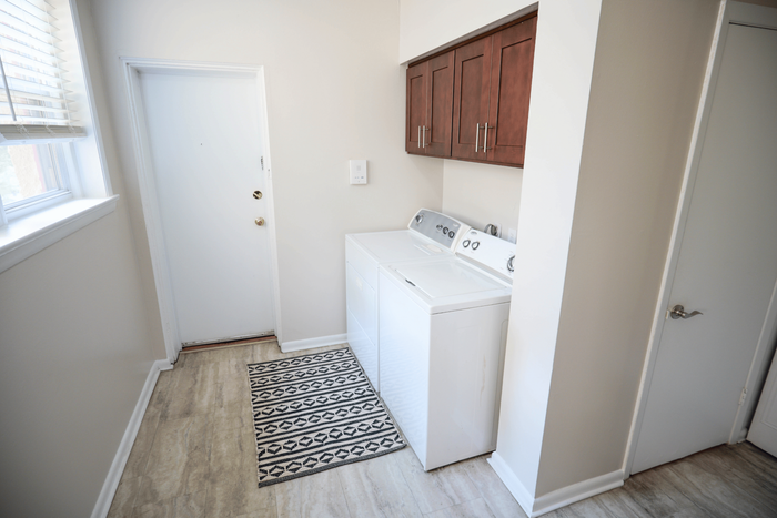 Spacious Sevilla Court apartment featuring convenient in-unit washer and dryer