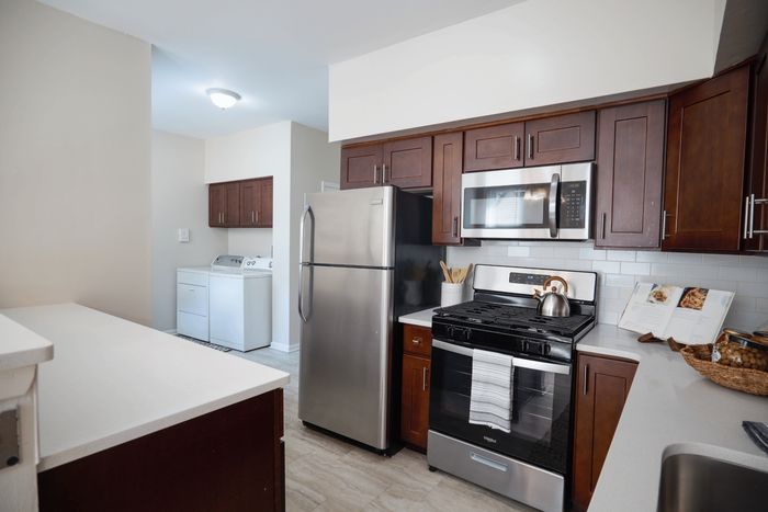 Sevilla Court apartment with modern updated kitchen and in-unit washer and dryer