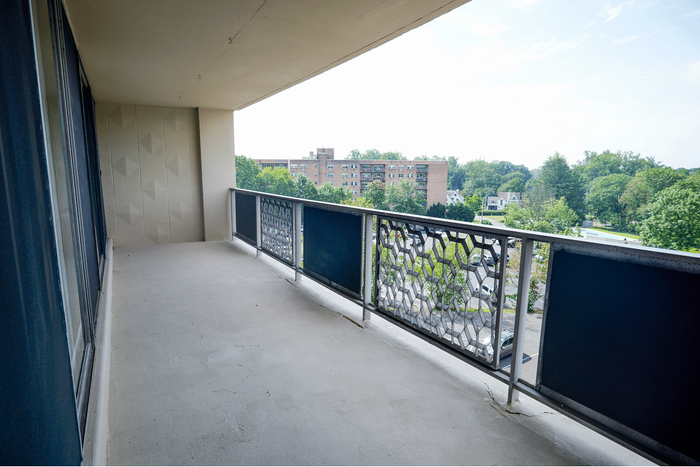 Spacious private balcony at Wynnewood House offering expansive outdoor living space.