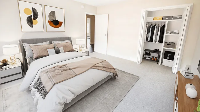 Elegant bedroom with a plush bed, modern decor, and spacious organized closet, ideal for stylish living.