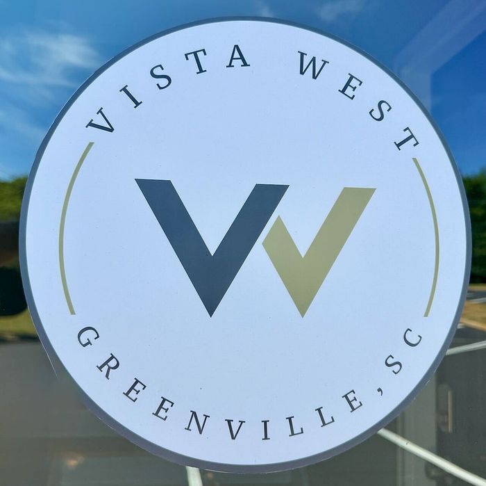 Chic Vista West logo featuring sleek design, located in vibrant Greenville, SC.