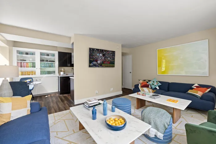 living room with two couches and tv