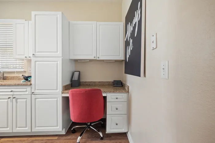 built-in desk by kitchen