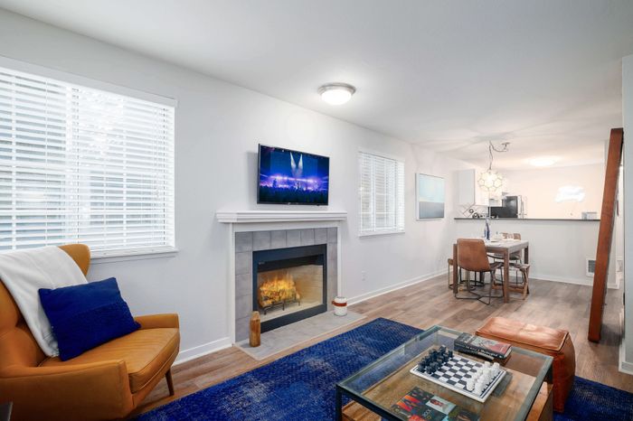 model living room with fireplace
