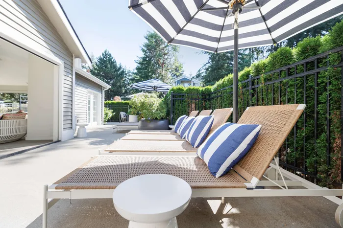 outdoor lounge chairs by pool