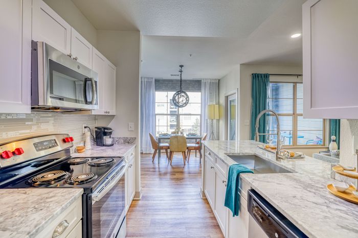 kitchen with dining in background