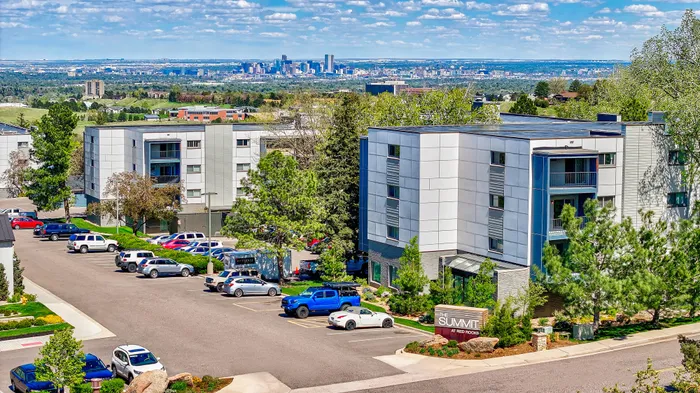 Building exterior with denver skyline in background