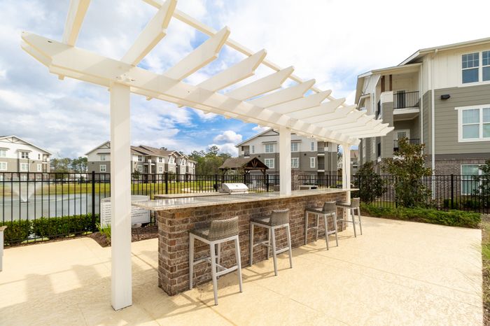 outdoor seating area and grills