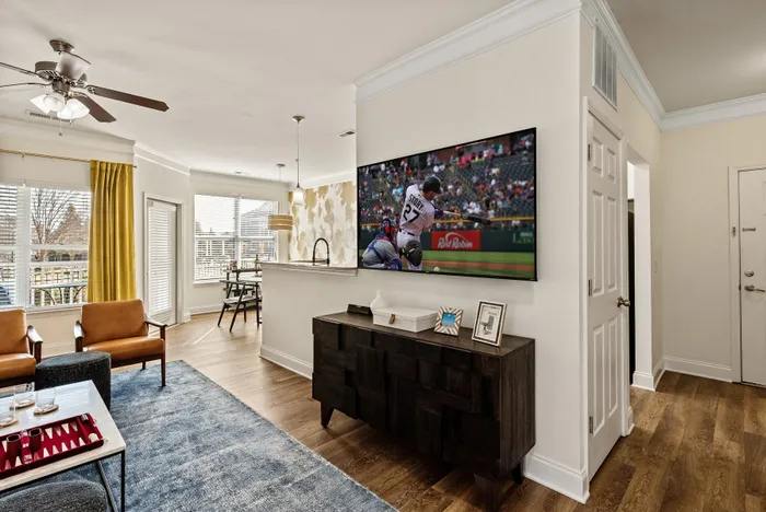 living room with tv on
