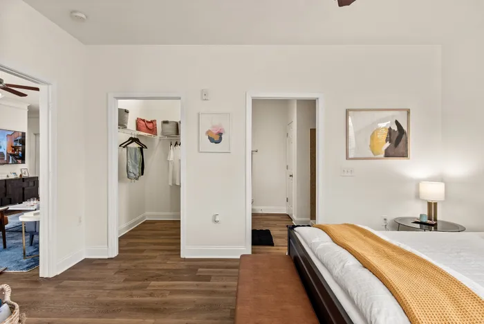 bedroom showing closet and bathroom