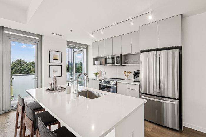 apartment model kitchen stainless steel appliances