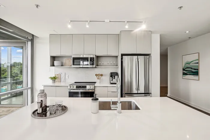 apartment model kitchen stainless steel appliances