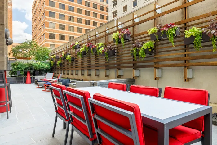 rooftop seating with orange chairs