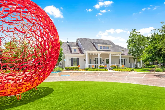 clubhouse exterior and red ball art