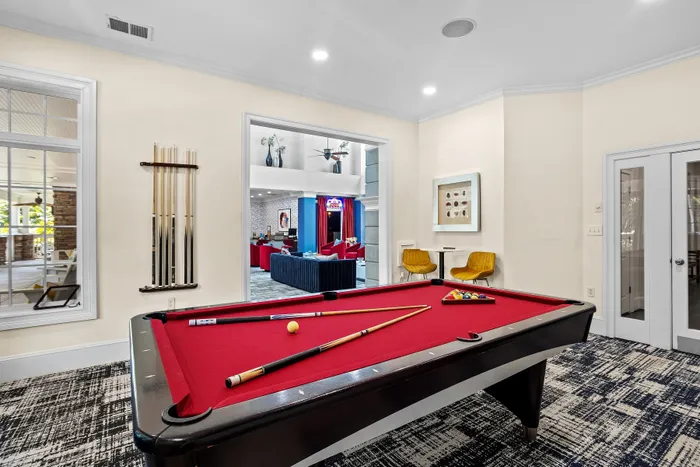 billiards table with bright red velvet