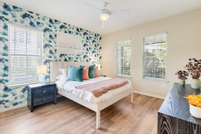 bedroom with white comforter