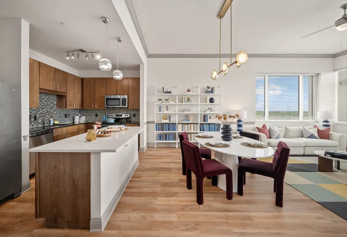 kitchen with stainless steel appliances and dining area