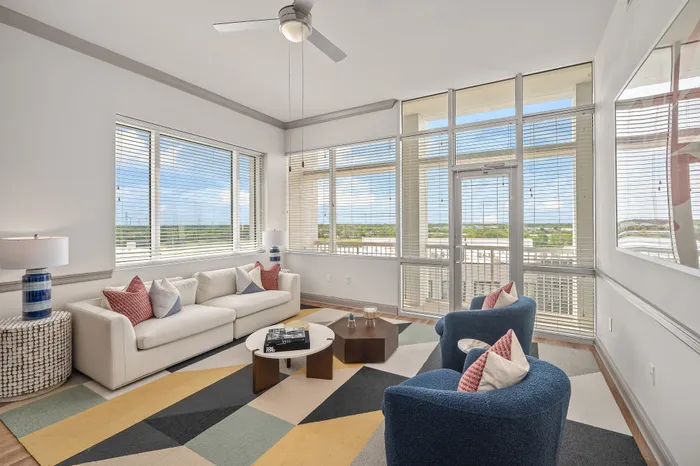 spacious living room with big windows
