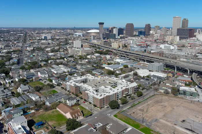 aerial of building with city landscaping behind