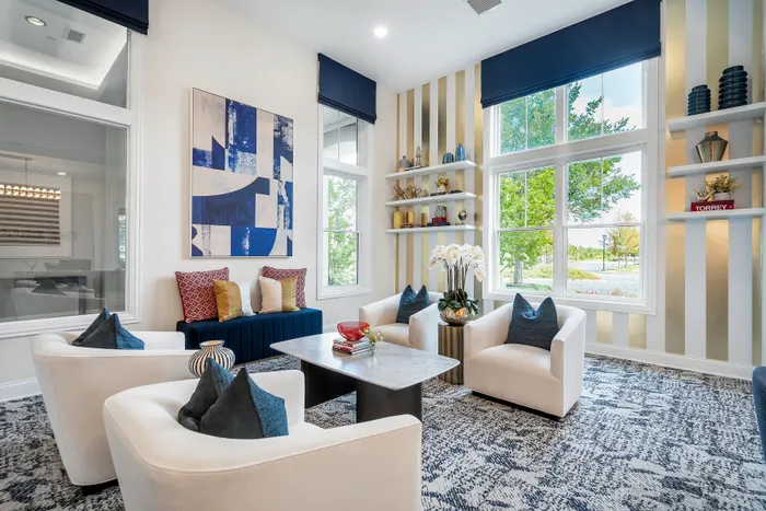 clubhouse lounge seating with white chairs