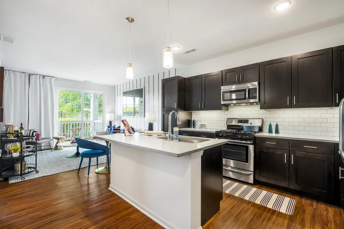 kitchen with brown cabinetry and island