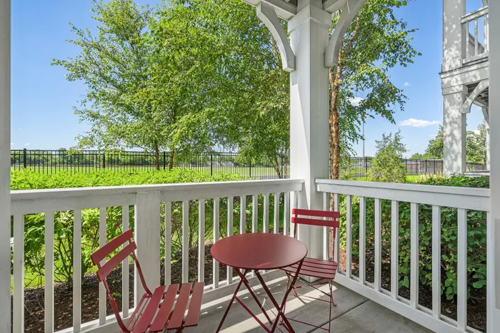 patio with red chairs